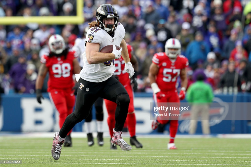 ORCHARD PARK, NEW YORK - DECEMBER 08: Hayden Hurst #81 of the Baltimore Ravens scores a touchdown during the third quarter of an NFL game against the Buffalo Bills at New Era Field on December 08, 2019 in Orchard Park, New York. (Photo by Bryan M. Bennett/Getty Images)