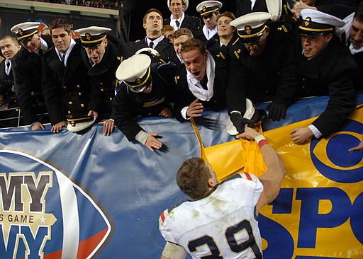 Navy Midshipmen celebrate with fans