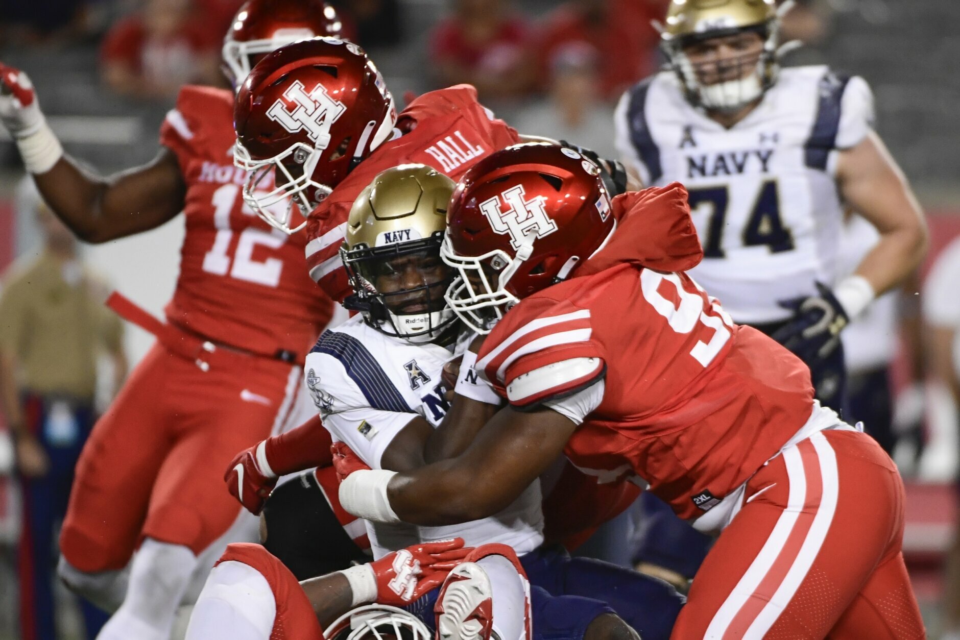 Navy shows positive signs but loses to Houston 28-20