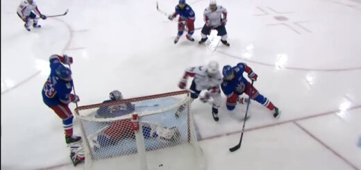 Marcus Johansson pushes the puck past the Rangers' Igor Shesterkin for the opening goal