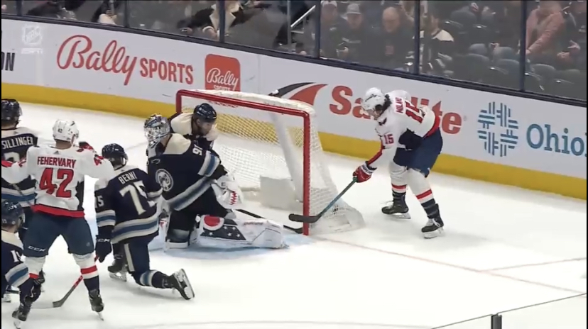 The winning goal is scored after a deflection off Capitals' defenseman Martin Fehervary's helmet against the Columbus Blue Jackets in NHL action.